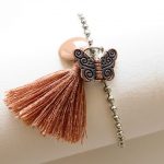 bracelet papillon pompon